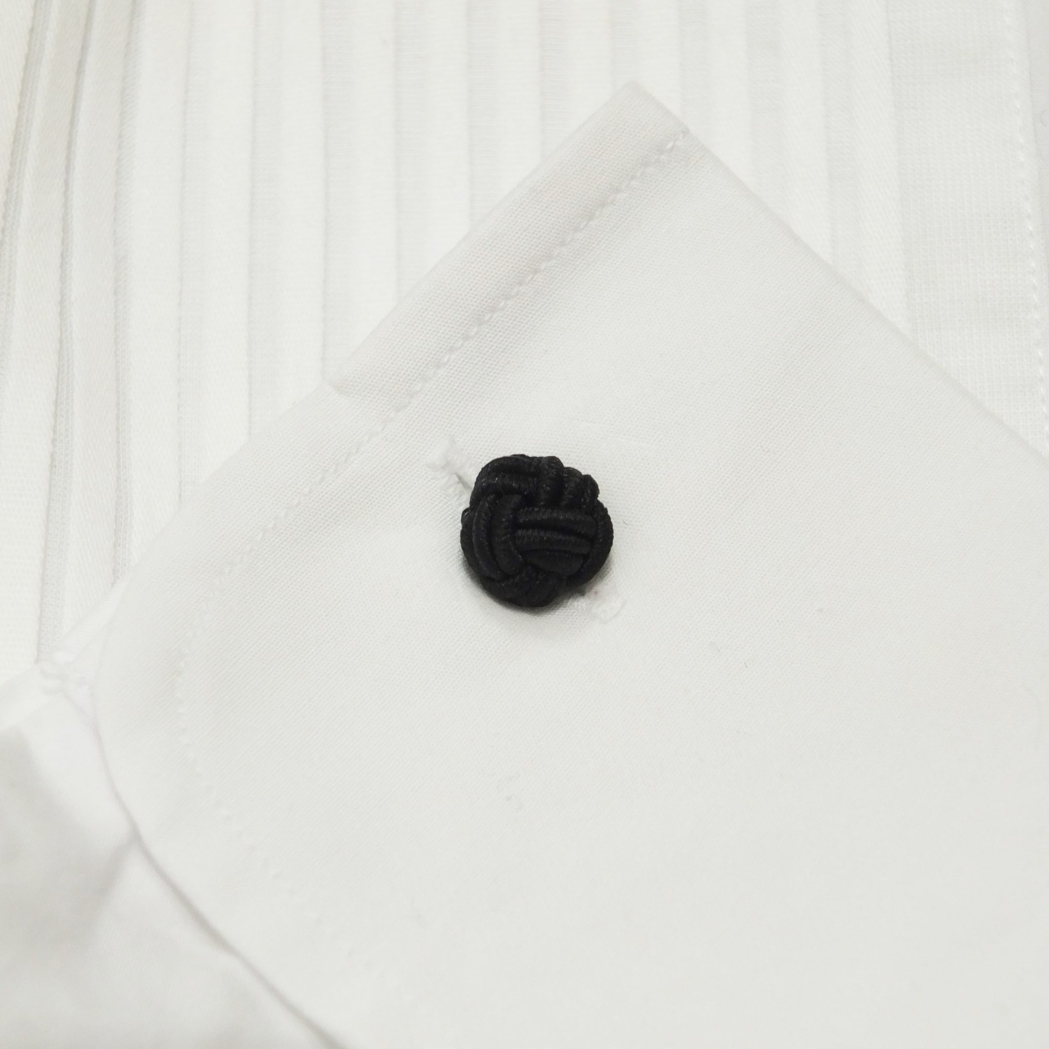 Black silk knot in a double cuff shirt