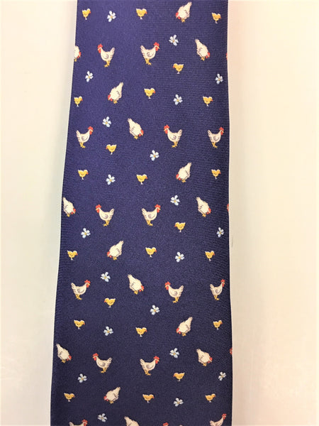 Air force blue silk tie with chicken and flower print close up